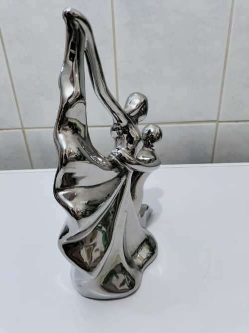 A Magnificent Dancing Couple Glass Statue