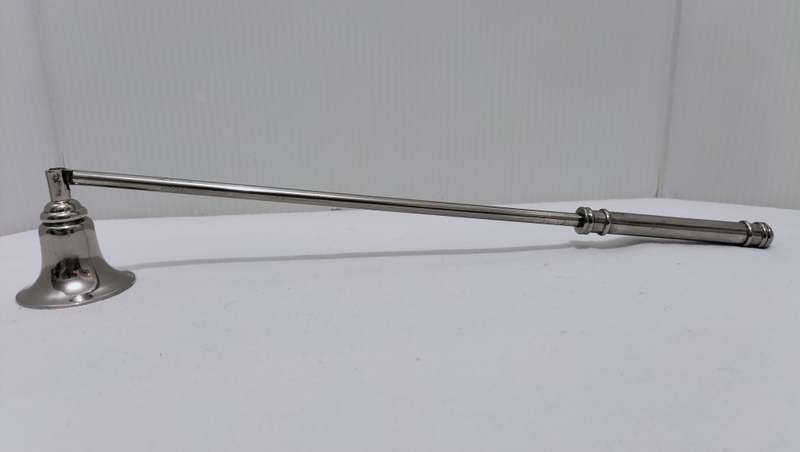 A Beautiful Stainless Steel Candle Snuffer.