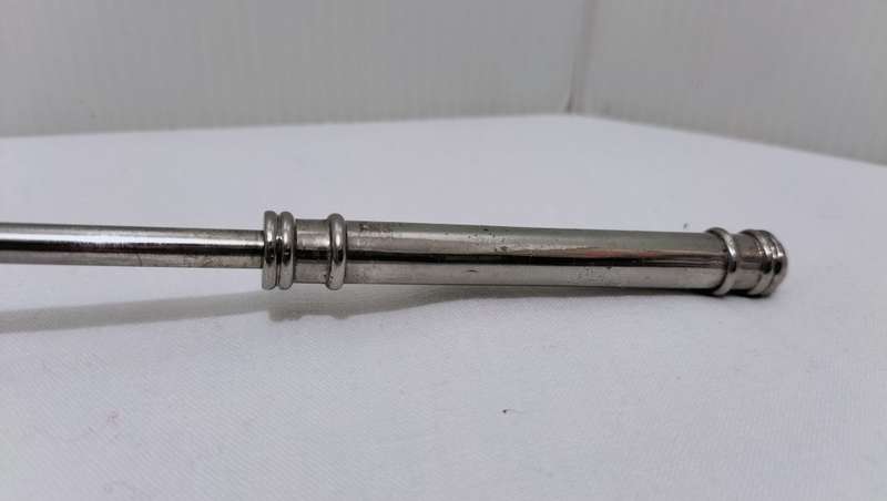 A Beautiful Stainless Steel Candle Snuffer.