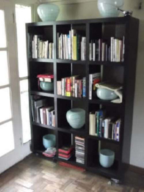 Bookcase in dark wood.