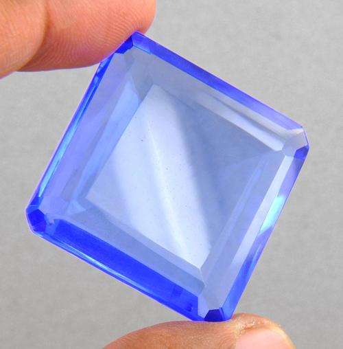 MGL Certified 91.76 Ct Natural Blue Topaz Gemstone - Emerald Cut