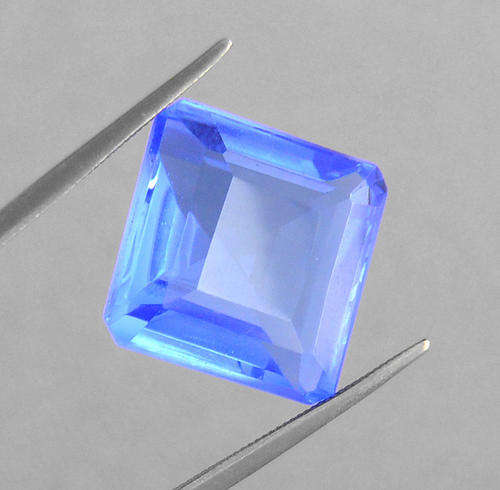 MGL Certified 15.52 Ct Natural Blue Topaz Gemstone - Emerald Cut