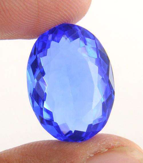 23.66 Ct Certified Oval Mixed Cut Blue Topaz Gemstone