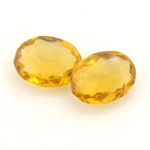 14.80 Carat Certified Oval Mixed Cut Citrine Gemstone Pair