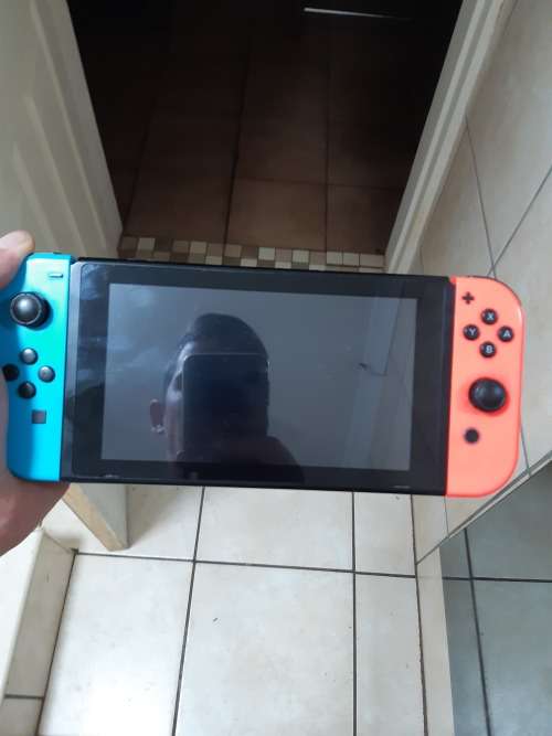 Nintendo switch console plus games