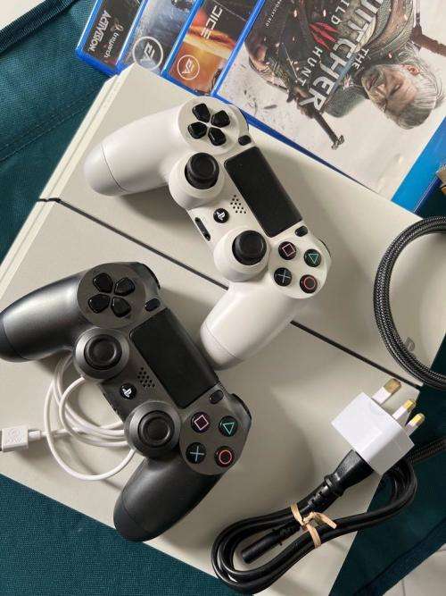 Play Station 4,  1TB, 2 controllers and 6 games