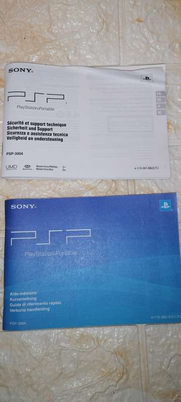 Psp 3004 with 2 games and new 3600mah battery