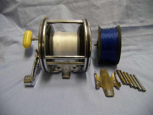 PENN 49 A . With conversion kit to narrow spool