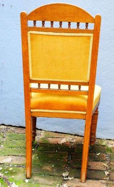 Edwardian Oak Chairs on castors in good condition: Set of 6 ( Bid for the set )