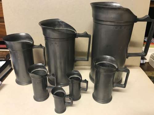 Set of  7 Victorian Pewter/Tin Measure Jugs ( set of 7, from 20 cm to 4 cm )