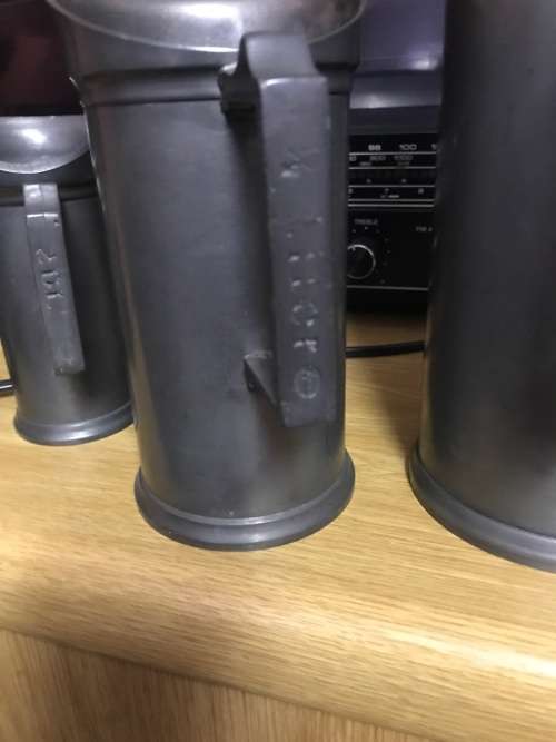 Set of  7 Victorian Pewter/Tin Measure Jugs ( set of 7, from 20 cm to 4 cm )