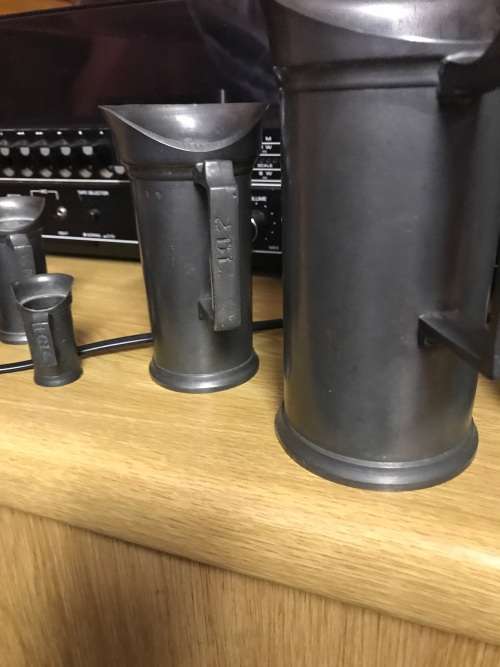 Set of  7 Victorian Pewter/Tin Measure Jugs ( set of 7, from 20 cm to 4 cm )