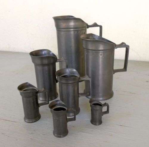 Set of  7 Victorian Pewter/Tin Measure Jugs ( set of 7, from 20 cm to 4 cm )