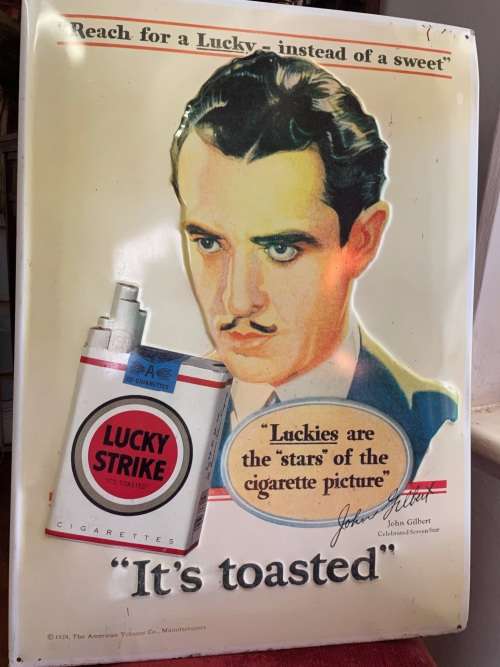 Vintage Lucky Strike Embossed Tin Sign