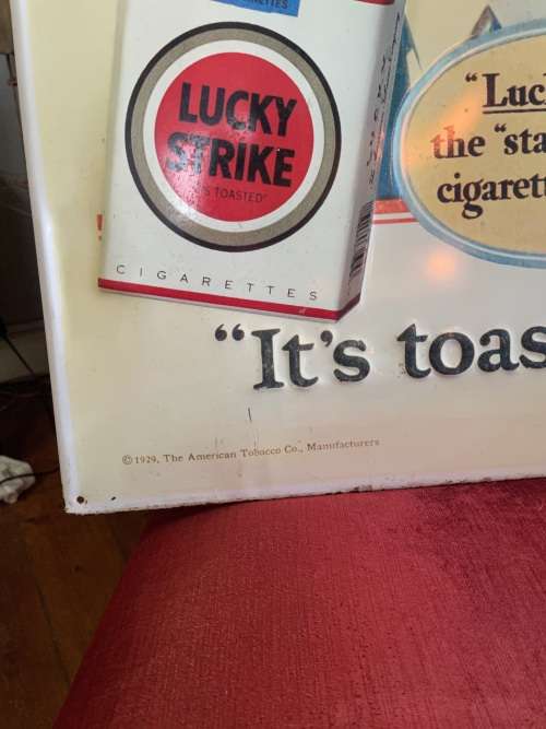 Vintage Lucky Strike Embossed Tin Sign