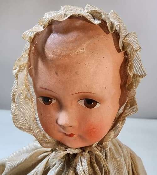 Super Rare Mechanical Bisque Doll ( Automation ) on wheels . ( 29 x 20 x 25 cm )