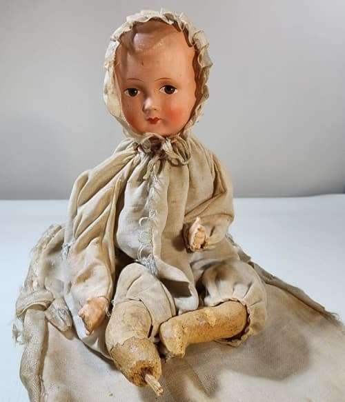 Super Rare Mechanical Bisque Doll ( Automation ) on wheels . ( 29 x 20 x 25 cm )