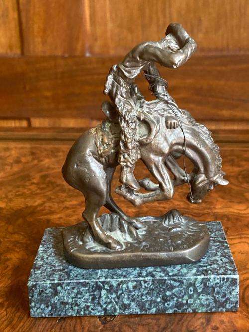 Pair of small Remington Bronzes ( 11 cm high )