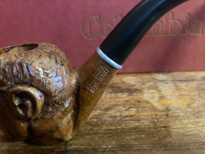 Briar Wood Pipes : a Pair carved with image of the Pope.
