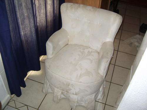 Uphostered wingback chair.