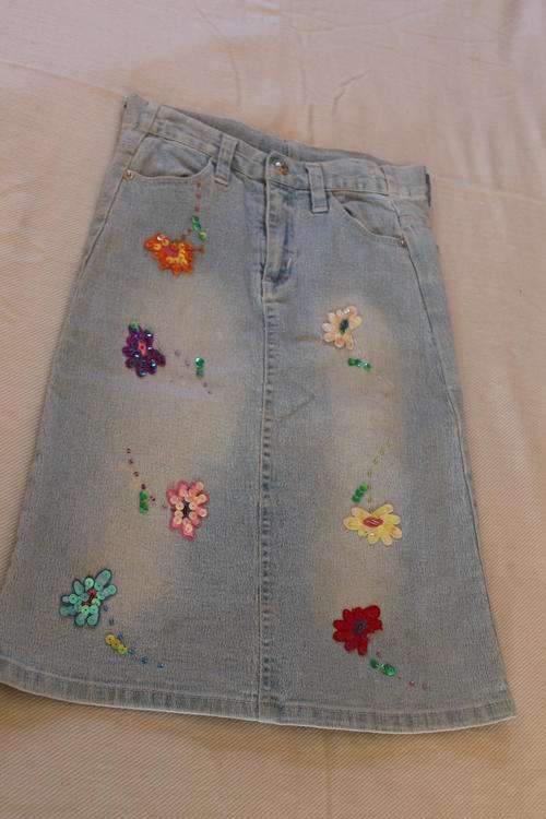 Denim skirt with sequinned flowers