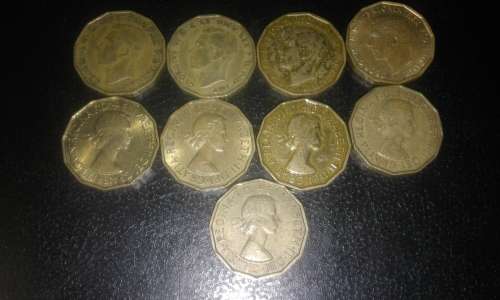 9* British Three Pence coins