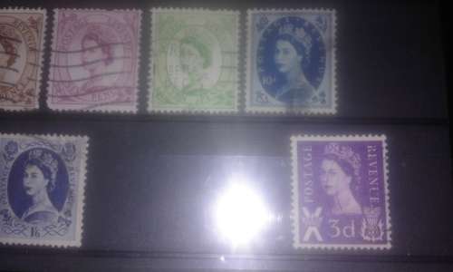 16 x stamps with the queens head on