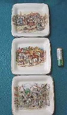 Three Sandland ware small decorative plates
