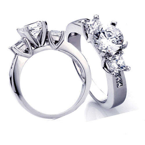 1.25 CT ROUND & PRINCESS DIAMOND ENGAGEMENT RING 14K (R55265.00)