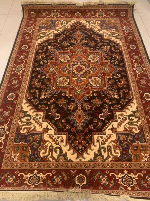Heris design persian carpet