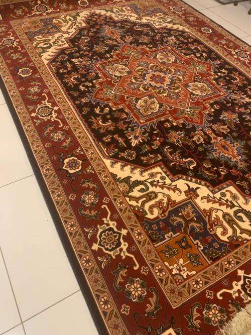 Heris design persian carpet