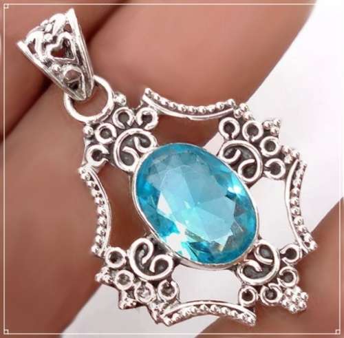 Indonesian Bali- Java Natural Blue Topaz Oval Gemstone set in Solid .925 Sterling Silver Pendant