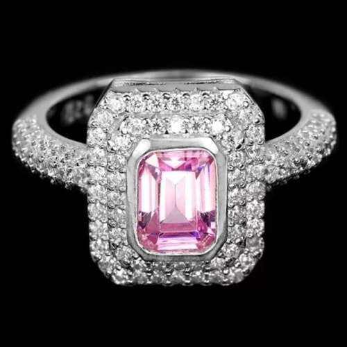 Deluxe Emerald Cut Pink and White Cubic Zirconia's set in Solid .925 Silver 14K W/G Ring Size 7 or O