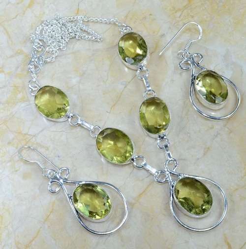 Faceted Peridot Ovals set in .925 Sterling Silver Plated Handmade Necklace and Earrings Set