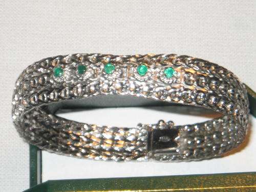 Silver bracelet with 5 green stones
