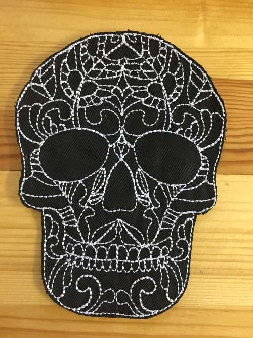 BDG276 Larger size Redwork Skull badge patch in white