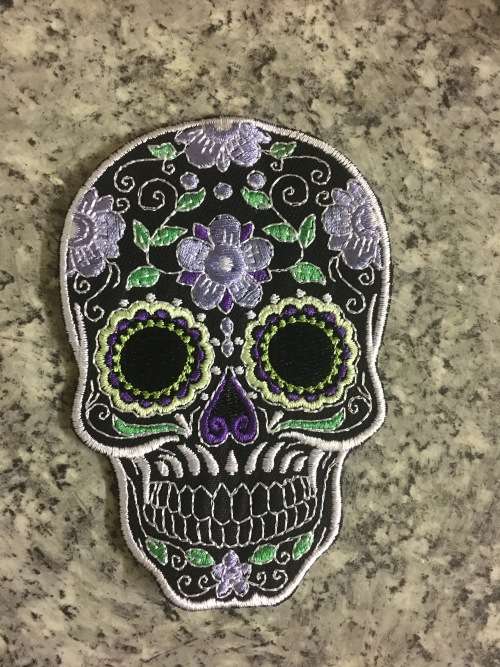 BDG315 Sugar skull badge patch in purple on black