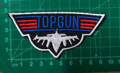 Top gun badge patch with plane front view