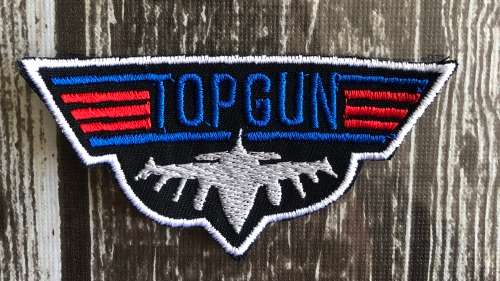 Top gun badge patch with plane front view