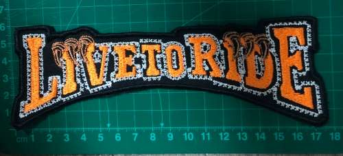 Live to ride eagle patch in orange and white 17.5cm x 6cm