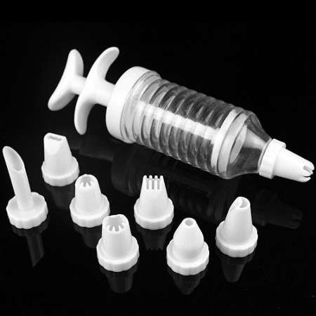 CAKE DECORATOR WITH 8 PIECE MOULDS