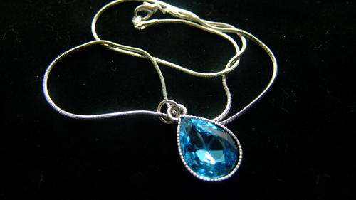 Stunning light blue tear drop pendant