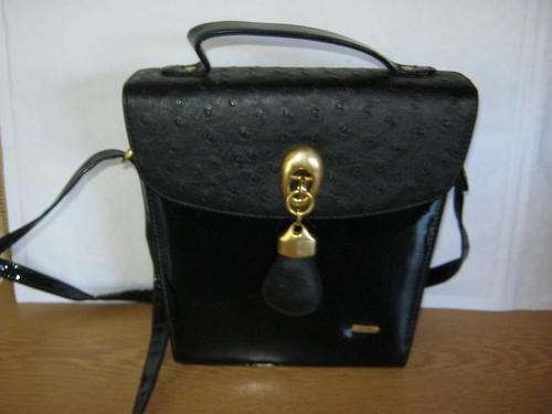 Beauitful black with gold trim handbag