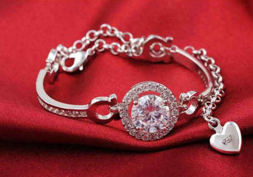 STERLING SILVER 925 FILLED LADIES PENDANT AND BRACELET SET WITH SIMULATED DIAMONDS