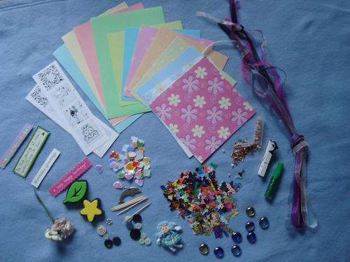 Great Scrapbooking Kit with papers and embellishments