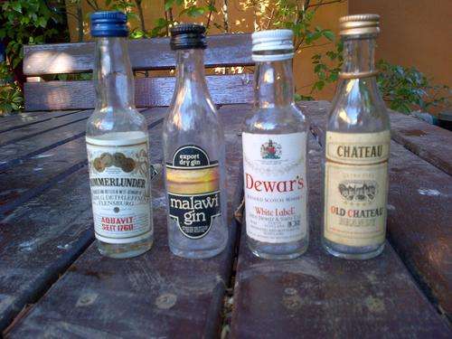 VINTAGE MINIATURE BOTTLES (4)