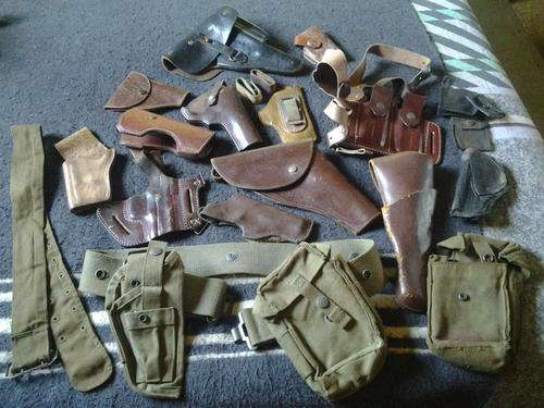 Assorted hosters and webbing belt.