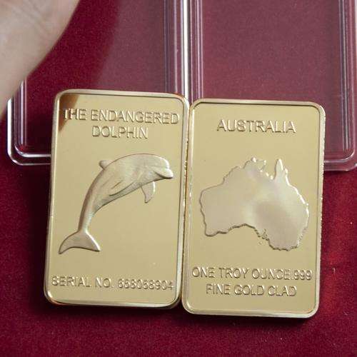 The Endangered Dolphin 1oz .999 24k Gold Clad bar.