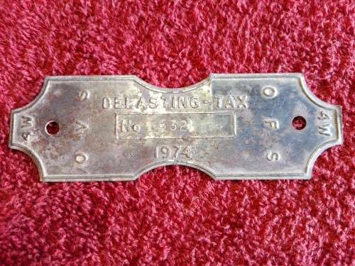 Vintage 1974 OFS Tax Plaque