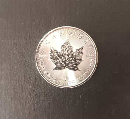 RARE 2021 CANDIAN 1 OZ SILVER COIN (UNC)(CAPSULED)